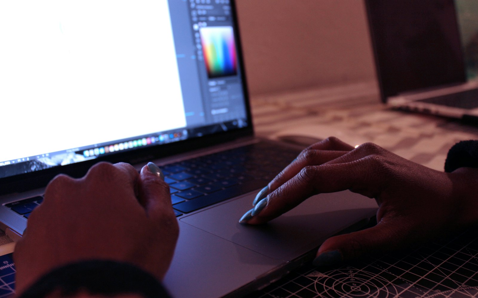 Designer's hands working on brand design