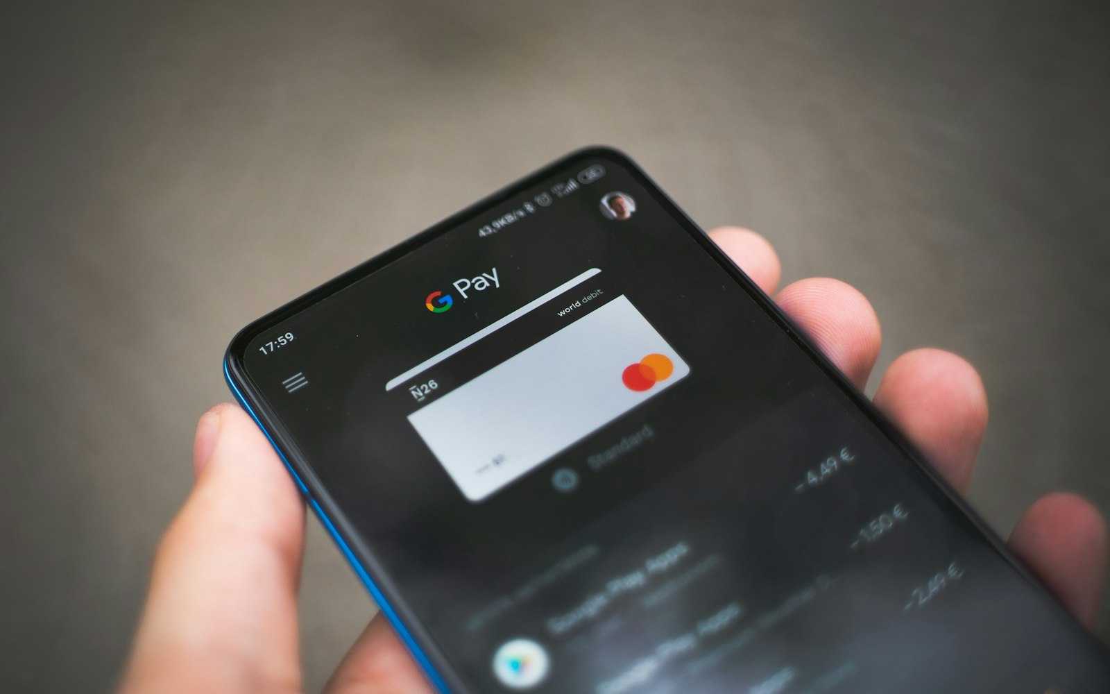 Smartphone payment app with a card