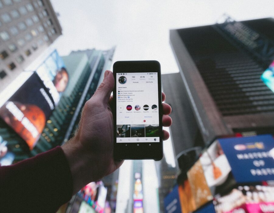 Phone showing a social media feed